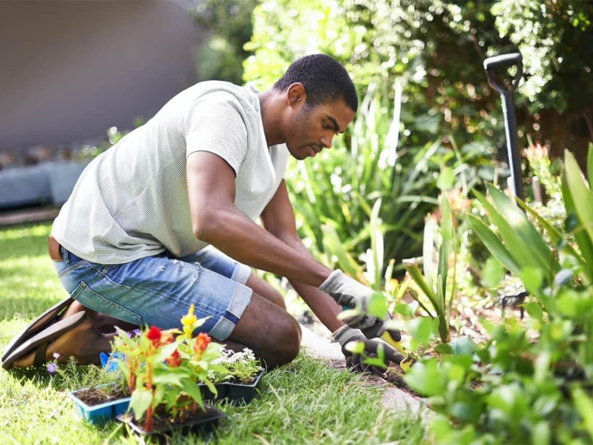 A Tasker working in a customer's garden